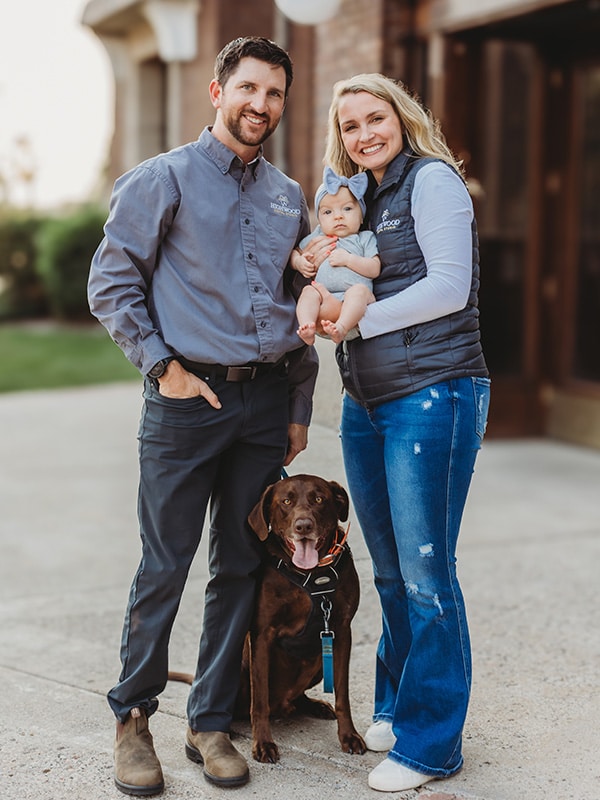 Dr. Powell and family and their dog